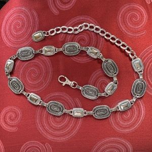 Silver metal belt ... or is it a bracelet?